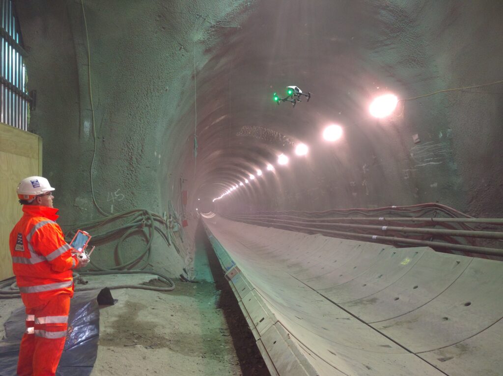 Crossrail engineer using airborne drone in a tunnel